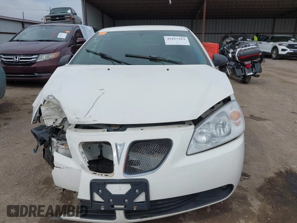 2006 Pontiac G6 6-Cyl z VIN 1G2ZG558364124834, wystawiony jako IAAI lot #41815411 z przebiegiem Nie podano mil oraz . Historia ofert i sprzedaży dostępna na DreamBid. Obrazek 11.