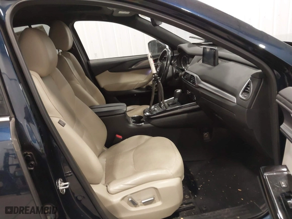 2016 Mazda CX-9 Grand Touring with VIN JM3TCBDY9G0109770, listed as a IAAI auction lot 41551085 with 131,812 mi miles. Bid and sale history available at carsss.com. Image 5.
