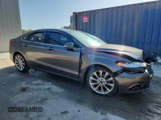 2017 Ford Fusion Titanium z VIN 3FA6P0D96HR251752, wystawiony jako Copart lot #61568705 z przebiegiem 173 479 mil mil oraz Nie do naprawy • Non repairable. Historia ofert i sprzedaży dostępna na DreamBid. Obrazek 4.