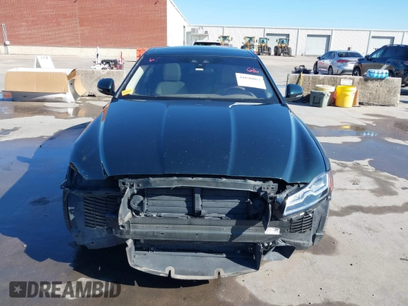 2017 Jaguar XF 35t Prestige with VIN SAJBE4BV0HCY47218, listed as a IAAI auction lot 41040063 with 100,823 mi miles. Bid and sale history available at carsss.com. Image 13.
