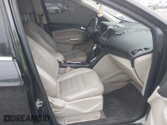 2014 Ford Escape Titanium with VIN 1FMCU9J90EUC24898, listed as a IAAI auction lot 42166523 with 152,464 mi miles and . Bid and sale history available at DreamBid. Image 5.