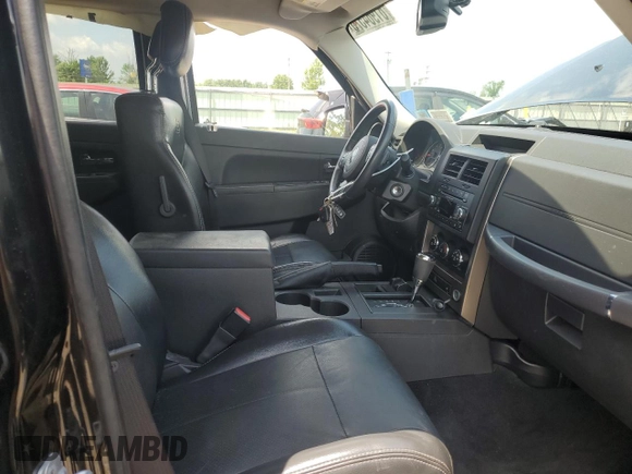 2012 Jeep Liberty Sport with VIN 1C4PJMAK9CW182088, listed as a Copart auction lot 61964575 with 107,911 mi miles and Salvage title. Bid and sale history available at DreamBid. Image 7.