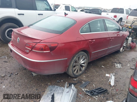 2013 Volkswagen CC VR6 Executive 4Motion with VIN WVWGU7AN9DE561506, listed as a IAAI auction lot 41459074 with 70,128 mi miles. Bid and sale history available at carsss.com. Image 4.