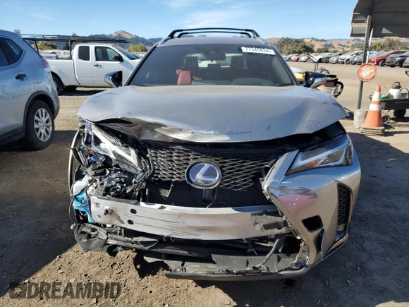 2022 Lexus UX 250h F Sport with VIN JTHE9JBH2N2062143, listed as a Copart auction lot 77345634 with 13,118 mi miles and Salvage Title. Bid and sale history available at DreamBid. Image 5.