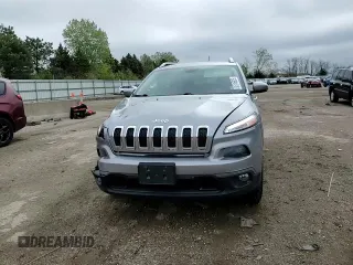 2015 Jeep Cherokee Latitude z VIN 1C4PJMCS2FW684703, wystawiony jako Copart lot #55116625 z przebiegiem 154 049 mil mil oraz Szkoda całkowita • Salvage title. Historia ofert i sprzedaży dostępna na DreamBid. Obrazek 13.