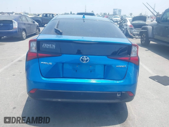 2021 Toyota Prius L Eco with VIN JTDKAMFUXM3134462, listed as a IAAI auction lot 42450931 with 89,239 mi miles and . Bid and sale history available at DreamBid. Image 16.