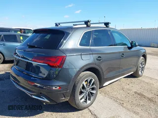 2021 Audi Q5 Premium Plus z VIN WA1BAAFY6M2013249, wystawiony jako IAAI lot #38681569 z przebiegiem 68 694 mil mil oraz . Historia ofert i sprzedaży dostępna na DreamBid. Obrazek 4.
