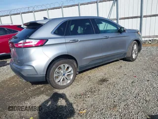 2022 Ford Edge Titanium z VIN 2FMPK4K95NBA38997, wystawiony jako IAAI lot #41467300 z przebiegiem 74 310 mil mil oraz . Historia ofert i sprzedaży dostępna na DreamBid. Obrazek 4.