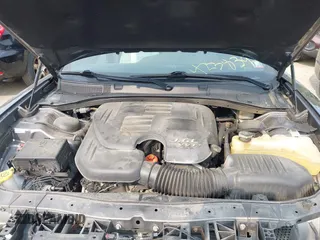 2015 Dodge Charger SXT with VIN 2C3CDXHGXFH897395, listed as a IAAI auction lot 42383907 with 145,334 mi miles and . Bid and sale history available at DreamBid. Image 10.