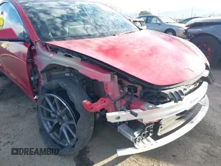 2022 Tesla Model 3 with VIN 5YJ3E1EA1NF288903, listed as a IAAI auction lot 41610215 with 96,050 mi miles and . Bid and sale history available at DreamBid. Image 6.