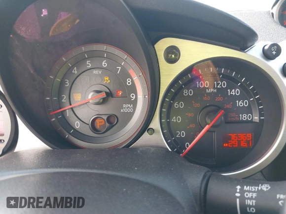 2013 Nissan 370Z z VIN JN1AZ4EH1DM880739, wystawiony jako IAAI lot #40474120 z przebiegiem 76 369 mil mil oraz . Historia ofert i sprzedaży dostępna na DreamBid. Obrazek 7.