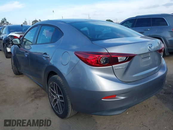 2015 Mazda 3 i Sport with VIN 3MZBM1U71FM195796, listed as a IAAI auction lot 41081641 with 144,737 mi miles and . Bid and sale history available at carsss.com. Image 3.