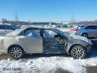 2014 Toyota Camry SE with VIN 4T1BK1FK6EU026342, listed as a IAAI auction lot 41246628 with 142,586 mi miles. Bid and sale history available at carsss.com. Image 13.