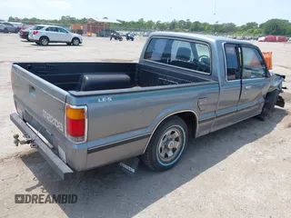 1992 Mazda B-Series Truck with VIN JM2UF313XN0306779, listed as a IAAI auction lot 42104583 with 137,826 mi miles and . Bid and sale history available at DreamBid. Image 4.