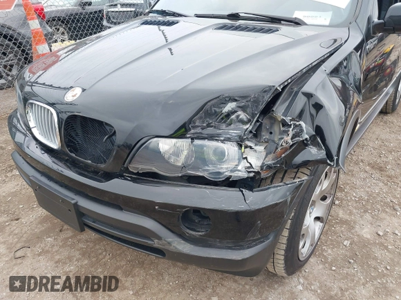 2002 BMW X5 4.4i with VIN 5UXFB33582LH31341, listed as a IAAI auction lot 41548139 with 82,188 mi miles. Bid and sale history available at carsss.com. Image 6.