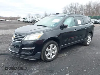 2017 Chevrolet Traverse LT with VIN 1GNKRGKD9HJ262832, listed as a IAAI auction lot 41936803 with 97,812 mi miles and . Bid and sale history available at DreamBid. Image 2.