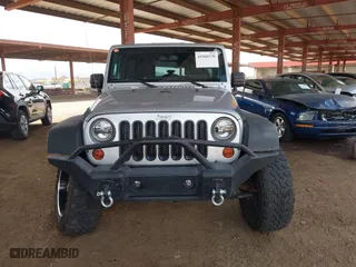 2010 Jeep Wrangler Unlimited Sport with VIN 1J4BA3H18AL161243, listed as a IAAI auction lot 41960370 with 89,004 mi miles. Bid and sale history available at carsss.com. Image 12.