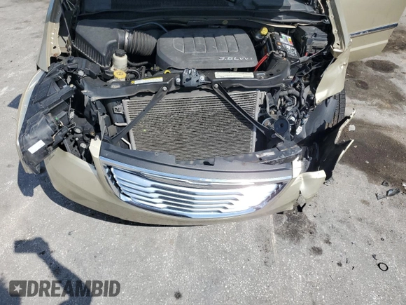 2011 Chrysler Town & Country Limited z VIN 2A4RR6DG5BR746552, wystawiony jako Copart lot #56215685 z przebiegiem 143 505 mil mil oraz Szkoda całkowita • Salvage title. Historia ofert i sprzedaży dostępna na DreamBid. Obrazek 12.