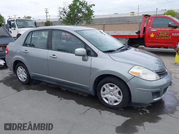 2011 Nissan Versa 1.8 S with VIN 3N1BC1AP0BL461824, listed as a IAAI auction lot 42076994 with 180,798 mi miles. Bid and sale history available at carsss.com. Image 1.