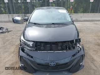 2021 Toyota Prius LE z VIN JTDKAMFP0M3179016, wystawiony jako IAAI lot #42204095 z przebiegiem 34 691 mil mil oraz . Historia ofert i sprzedaży dostępna na DreamBid. Obrazek 13.
