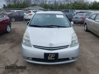 2007 Toyota Prius z VIN JTDKB20U977666406, wystawiony jako IAAI lot #42081233 z przebiegiem Nie podano mil oraz . Historia ofert i sprzedaży dostępna na DreamBid. Obrazek 12.