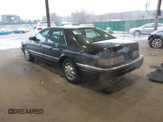 1997 Cadillac Seville Luxury SLS with VIN 1G6KS52YXVU816736, listed as a IAAI auction lot 41854220 with 107,091 mi miles. Bid and sale history available at carsss.com. Image 3.