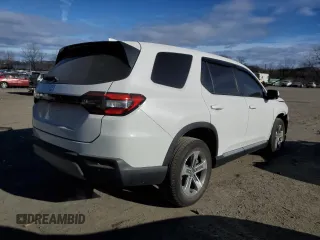 2024 Honda Pilot EX-L 7 Passenger with VIN 5FNYG1H52RB049090, listed as a Copart auction lot 41562695 with 9,939 mi miles and Salvage Title. Bid and sale history available at carsss.com. Image 3.