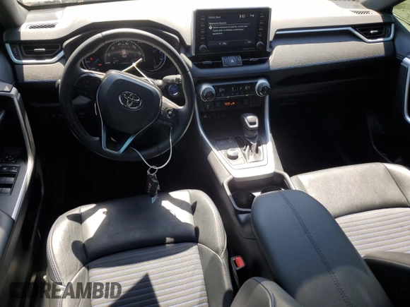2021 Toyota RAV4 Hybrid XSE with VIN 2T3E6RFV9MW016128, listed as a Copart auction lot 53323945 with 134,009 mi miles and Salvage title. Bid and sale history available at DreamBid. Image 8.