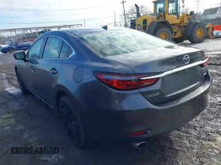 2020 Mazda 6 Grand Touring with VIN JM1GL1TY0L1521859, listed as a IAAI auction lot 41634368 with 36,709 mi miles and . Bid and sale history available at DreamBid. Image 3.