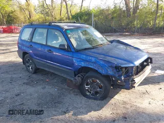 2003 Subaru Forester X with VIN JF1SG63613H743804, listed as a IAAI auction lot 42012850 with 266,100 mi miles. Bid and sale history available at carsss.com. Image 1.