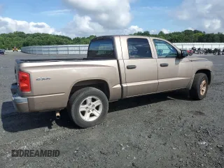2010 Dodge Dakota Bighorn/Lonestar z VIN 1D7RW3GK7AS223579, wystawiony jako Copart lot #61880374 z przebiegiem 102 134 mil mil oraz Czysty tytuł • Clean title. Historia ofert i sprzedaży dostępna na DreamBid. Obrazek 3.
