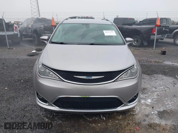 2018 Chrysler Pacifica Touring L with VIN 2C4RC1BGXJR142295, listed as a IAAI auction lot 41952592 with 135,092 mi miles and . Bid and sale history available at DreamBid. Image 12.