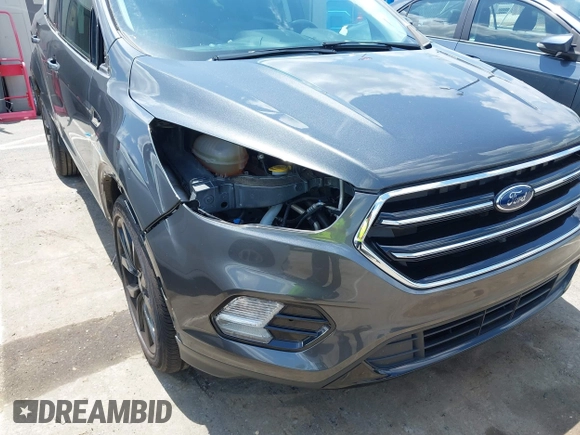 2019 Ford Escape SE z VIN 1FMCU0GD0KUB74569, wystawiony jako IAAI lot #42271476 z przebiegiem 66 335 mil mil oraz . Historia ofert i sprzedaży dostępna na DreamBid. Obrazek 21.