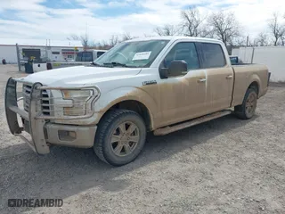2015 Ford F-150 XLT w/HD Payload Pkg with VIN 1FTFW1EF3FFB70225, listed as a IAAI auction lot 41890185 with 169,564 mi miles. Bid and sale history available at carsss.com. Image 2.