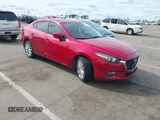 2017 Mazda 3 Touring with VIN 3MZBN1V79HM129043, listed as a IAAI auction lot 41970009 with 142,654 mi miles and . Bid and sale history available at DreamBid. Image 1.