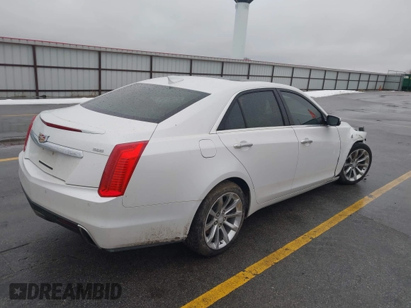 2017 Cadillac CTS Luxury AWD with VIN 1G6AX5SS6H0144758, listed as a IAAI auction lot 41745057 with 83,052 mi miles and . Bid and sale history available at DreamBid. Image 4.