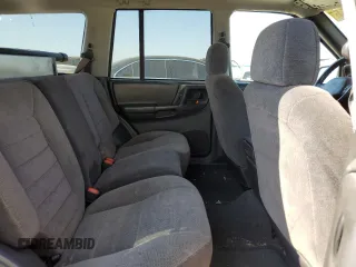 1997 Jeep Grand Cherokee TSi with VIN 1J4FX58SXVC545910, listed as a Copart auction lot 73142554 with 180,896 mi miles and Salvage Title. Bid and sale history available at carsss.com. Image 11.