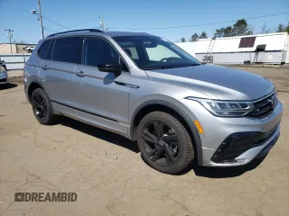 2023 Volkswagen Tiguan SE R-Line Black with VIN 3VV8B7AX3PM090643, listed as a Copart auction lot 52225065 with 60,680 mi miles and Salvage title. Bid and sale history available at DreamBid. Image 4.