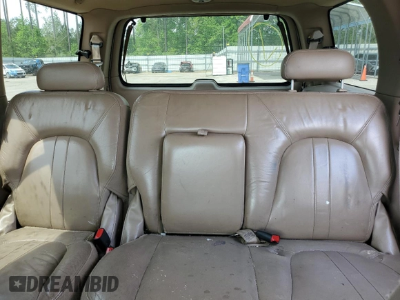 1999 Ford Expedition XLT z VIN 1FMPU18L0XLC10111, wystawiony jako Copart lot #52699205 z przebiegiem Nie podano mil oraz Szkoda całkowita • Salvage title. Historia ofert i sprzedaży dostępna na DreamBid. Obrazek 10.