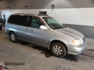 2004 Kia Sedona LX with VIN KNDUP131946569536, listed as a Copart auction lot 82963493 with 119,901 mi miles and Clean Title. Bid and sale history available at carsss.com. Image 4.