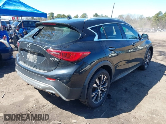 2018 Infiniti QX30 Premium with VIN SJKCH5CR7JA052747, listed as a IAAI auction lot 41993713 with 102,107 mi miles and . Bid and sale history available at DreamBid. Image 4.