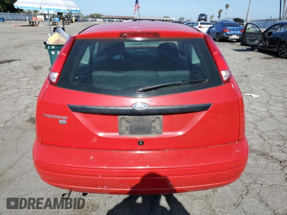 2007 Ford Focus S with VIN 1FAHP31N27W286022, listed as a Copart auction lot 56997445 with 112,157 mi miles and Salvage title. Bid and sale history available at DreamBid. Image 6.