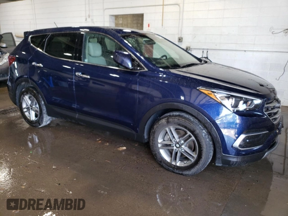 2018 Hyundai Santa Fe 2.4L z VIN 5XYZTDLB4JG553894, wystawiony jako Copart lot #56859585 z przebiegiem 97 313 mil mil oraz Szkoda całkowita • Salvage title. Historia ofert i sprzedaży dostępna na DreamBid. Obrazek 4.