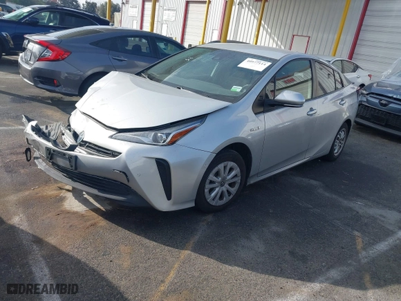 2021 Toyota Prius L Eco with VIN JTDKAMFU8M3135514, listed as a IAAI auction lot 40977114 with 70,451 mi miles. Bid and sale history available at carsss.com. Image 2.