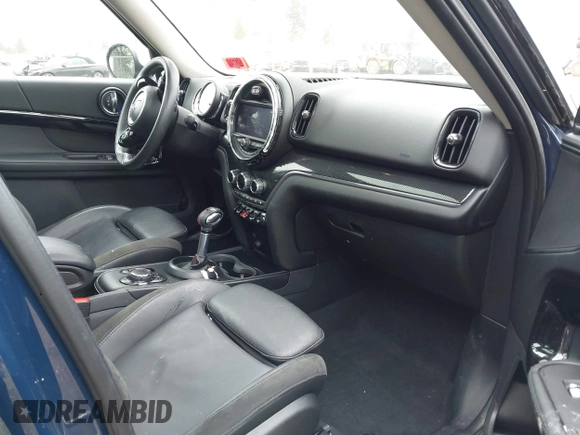 2019 MINI Countryman Cooper S z VIN WMZYT5C54K3G92704, wystawiony jako IAAI lot #41821521 z przebiegiem 95 087 mil mil oraz . Historia ofert i sprzedaży dostępna na DreamBid. Obrazek 5.