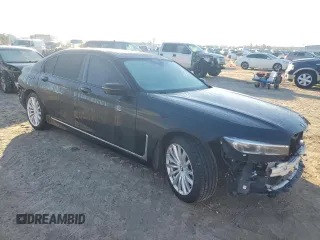 2020 BMW 7 Series 740i with VIN WBA7T2C0XLCE02429, listed as a Copart auction lot 42574835 with 73,970 mi miles and Salvage Title. Bid and sale history available at carsss.com. Image 4.