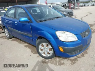2008 Kia Rio LX with VIN KNADE123486430555, listed as a IAAI auction lot 41875641 with 121,280 mi miles. Bid and sale history available at carsss.com. Image 1.