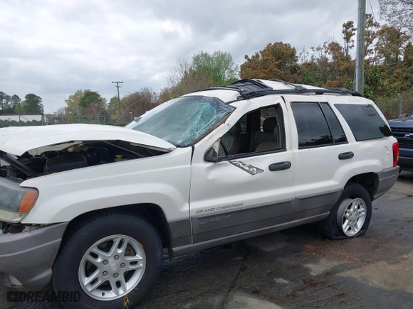 2003 Jeep Grand Cherokee Laredo with VIN 1J4GW48S33C521253, listed as a IAAI auction lot 41929756 with 209,686 mi miles. Bid and sale history available at carsss.com. Image 12.