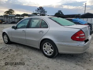 2003 Mercedes-Benz E-Class 3.2L with VIN WDBUF65J93A087012, listed as a Copart auction lot 67157614 with 146,985 mi miles and Salvage Title. Bid and sale history available at carsss.com. Image 2.