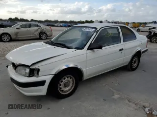 1996 Toyota Tercel DX z VIN JT2AC52L5T0158041, wystawiony jako Copart lot #80121114 z przebiegiem 35 691 mil mil oraz Szkody całkowita. Historia ofert i sprzedaży dostępna na DreamBid. Obrazek 1.